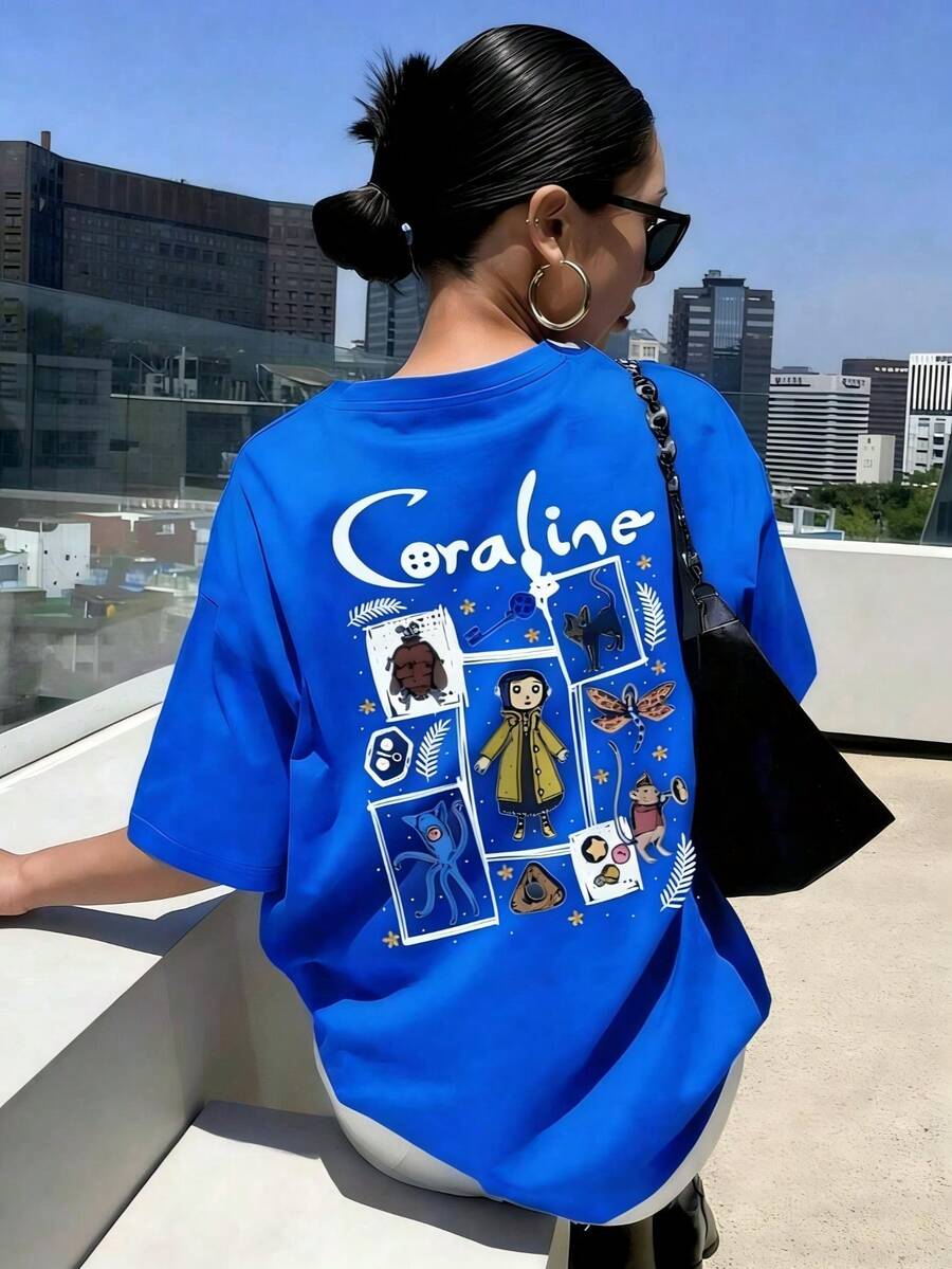 Women's Summer Cartoon And Slogan Graphic Round Neck Short Sleeved T Shirt ,Casual Loose And Versatile Holiday Style Tops,Fashionable Summer Outfits Suitable For Daily Holiday Wear,Halloween Costumes Women,Shalloween Atmosphere,Halloween Caroline And Ghost Graphic-White And Navy Off-The-Shoulder Cropped Top - 藍色 - 查看 1