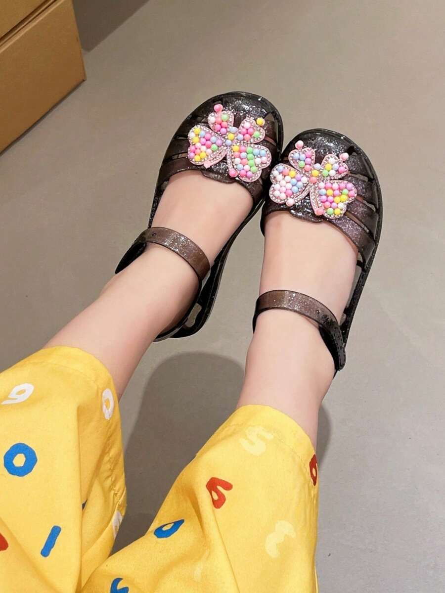Giày sandal đính nơ lấp lánh cho bé gái, kiểu dáng công chúa hở mũi, quai ngang mắt cá chân, thích hợp cho mùa hè đi biển và mặc hàng ngày. - màu đen - Xem 1