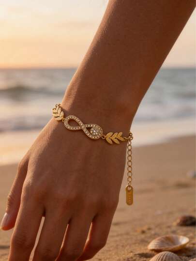 18K สร้อยข้อมือคริสตัลชุบทองลาย Infinity & Laurel Leaf, สร้อยข้อมือสแตนเลสสไตล์โบฮีเมียนสำหรับผู้หญิงสำหรับวันหยุดพักผ่อนที่ชายหาดในฤดูร้อนแบบปรับได้