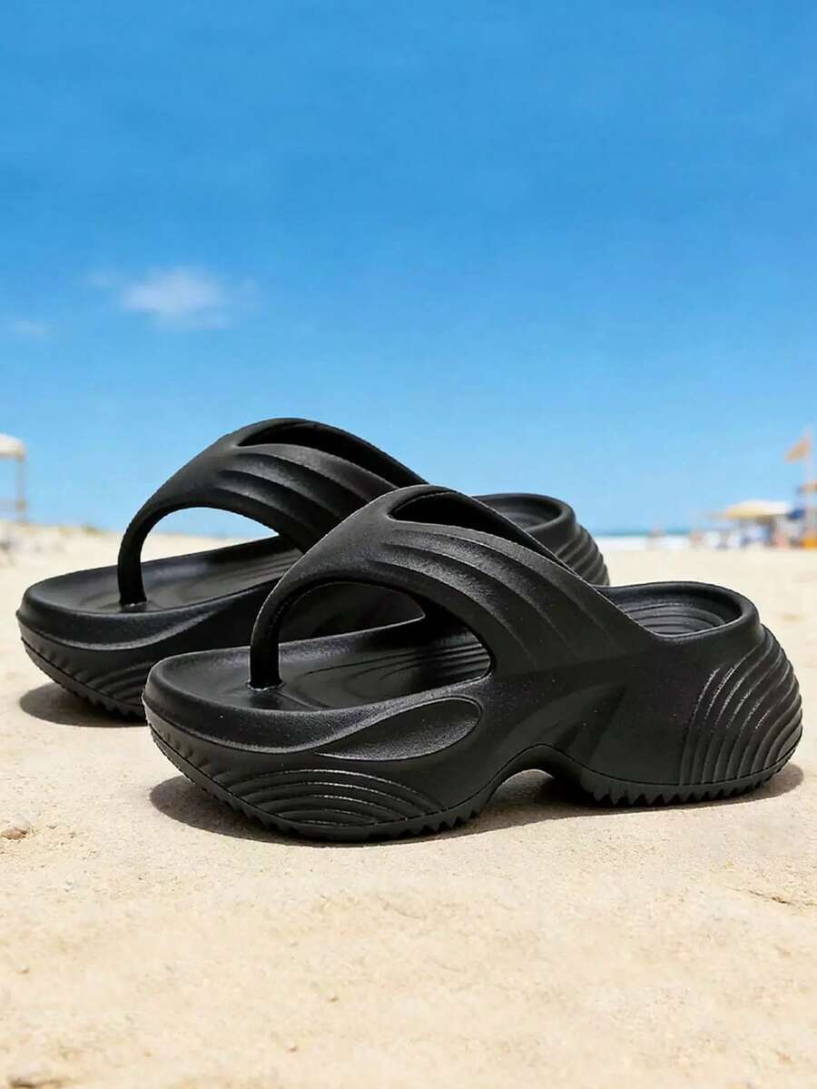 Dép xỏ ngón nữ mùa hè đế EVA màu đen, họa tiết lượn sóng, thể hiện cá tính, chống trơn trượt, bền chắc, phù hợp cho cả ở nhà và đi biển. - màu đen - Xem 1