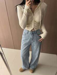 Quần jeans nữ ống đứng cạp cao thiết kế độc đáo với dây đeo khoét lỗ phía sau, thích hợp cho mùa hè. - Rửa nhẹ - Xem 8