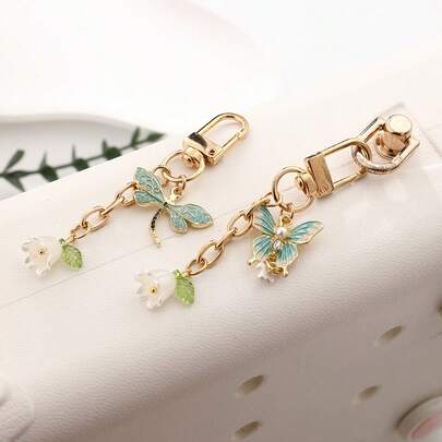 This Vintage-Style Keychain Features A Gold-Tone Ring And Alloy Chain, Decorated With Enamel Pendants Including Lily Of The Valley, Dragonfly, And Butterfly Patterns. Multifunctional And Practical, It Can Be Used As A Decorative Accessory For Keys, Handbags, And Backpacks, Adding An Ornamental Touch To Any Item. This Makes An Ideal Campus Souvenir.
