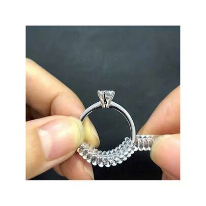Bộ 4 dụng cụ điều chỉnh kích cỡ nhẫn bằng silicon, phù hợp cho cả nam và nữ, giúp điều chỉnh kích cỡ nhẫn mà không làm thay đổi kích thước ban đầu.