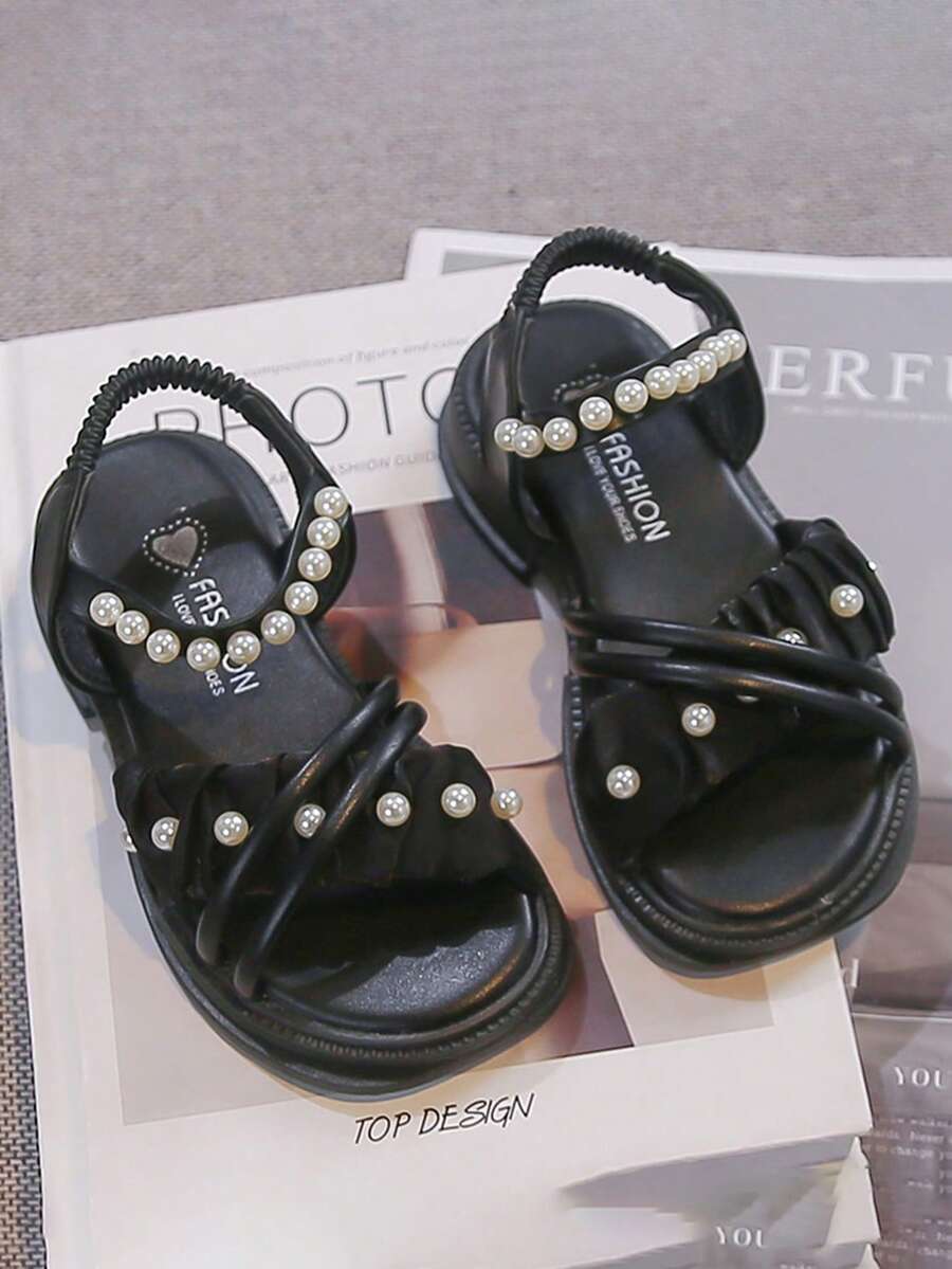 1 đôi sandal hở mũi đế dày cho bé gái, sandal đi biển đế dày đính ngọc trai thời trang mới mùa hè 2026, phù hợp cho bé gái từ 4-10 tuổi. - màu đen - Xem 1