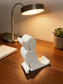 1个3D打印可爱狗狗造型创意手机支架，造型生动有趣，为桌面增添活力。它能稳固支撑手机，既是实用的桌面配件，也是独特的装饰品。 - 多色 - 查看 5