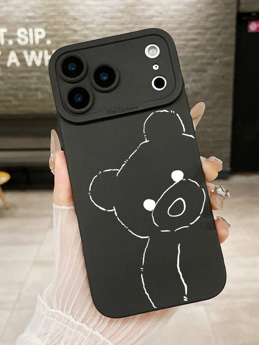 1 ốp lưng điện thoại màu đen in hình gấu hoạt hình, với thiết kế hình gấu vẽ đường nét tối giản, phong cách dễ thương và an ủi. Chất liệu mềm mại và thân thiện với da, chống rơi vỡ và chống trầy xước, bảo vệ toàn diện cho điện thoại khi sử dụng hàng ngày. - màu đen - Xem 1