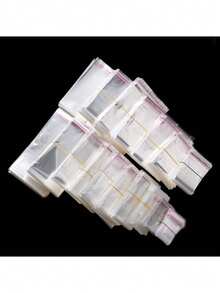 100 bolsas de embalaje de plástico OPP transparentes y autosellantes, adecuadas para empaquetar artículos como joyas, dulces - Ver 1