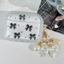 Hộp đựng tai nghe Apple thời trang (1 chiếc) có thiết kế nơ ngọc trai 3D màu đen, các chi tiết nơ màu đen và mặt dây chuyền nơ vàng. Sản phẩm chống sốc, bảo vệ và chống bụi, thời trang và đẹp mắt, phù hợp cho thanh thiếu niên và người trẻ tuổi, có thể sử dụng hàng ngày hoặc làm quà tặng. - Nhiều màu - Xem 6