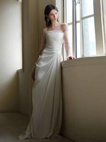 Elegant Off-Shoulder Satin Wedding Dress With Sheer Beaded Sleeves, Draped Bodice, And Sweep Train – Premium Heavyweight Satin Fabric, Fitted Mermaid Silhouette With Flared Hem, Off-Shoulder Neckline With Sheer Beaded Sleeves, Draped Bodice Detail, Sweep Train With Clean Hem, Available In Ivory – Perfect For Fall/Winter Indoor Church Weddings, Elegant Ballroom Ceremonies, And Modern Receptions, Luxurious And Structured Design, Ideal For Cooler Weather, International Export Quality, Suitable For Global Bridal Market - trắng - Xem 5
