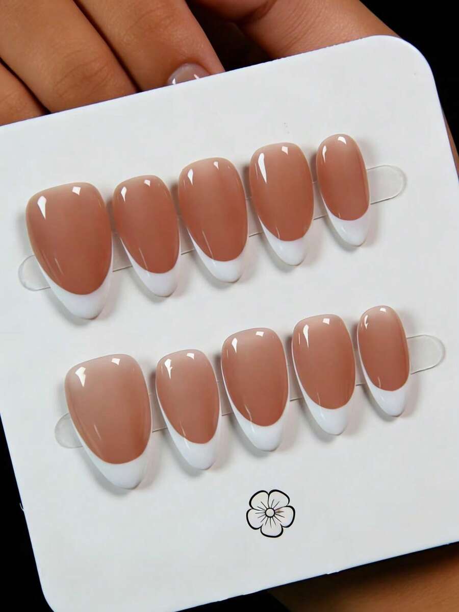 10 Pieces Of Handcrafted Short Almond-Shaped Press-On False Nails (Wearable Nails), A Nail Art Supply And Ornament. These Beautiful White Minimalist French-Style Fake Nails Can Slim And Brighten The Look Of Your Hands. They Are Reusable, Easy And Quick To Remove, And Come With Tools Like Jelly Glue And Nail File. - White - View 1