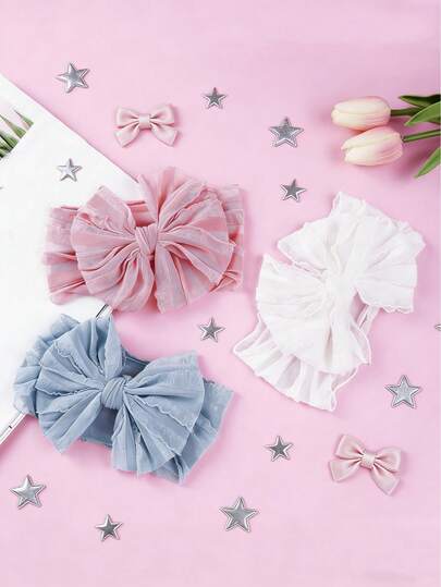 Bộ 3 băng đô nơ co giãn mềm mại cho bé gái, thoải mái khi sử dụng hàng ngày.