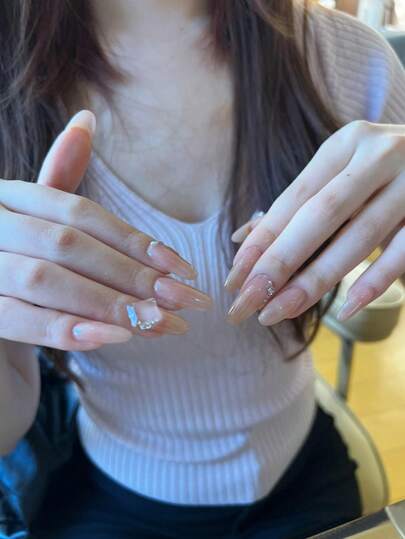 30 Pieces Press On Nails Long Droplet Shape/Gentle And Transparent Nude Powder Ice Block Diamond Nail Art, Based On Clear Nude Powder And Decorated With Three-Dimensional Ice Block Diamonds And Small Diamonds, With A Simple And Clean Style Full Of Fairy Atmosphere, Is A Versatile Temperament Suitable For Daily Commuting And Dating.