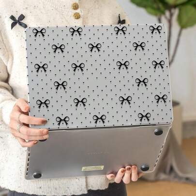 This Is A One-Piece, Black, Frosted Transparent Laptop Case With A Bow And Heart Pattern. It's Lightweight, Shockproof, And Compatible With MacBook Air 13-Inch/15-Inch And 14-Inch Pro M2 And M3 Chipsets. Combining Fingerprint Resistance, Shock Protection, And Heat Dissipation, It's The Perfect Gift For Holidays And Special Occasions.