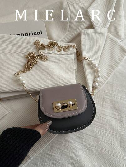 2026夏季新款时尚百搭珍珠装饰女士手提包，链条单肩/斜挎迷你口红包，马鞍包