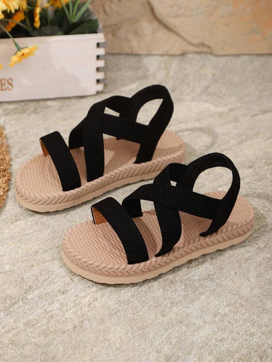 1 đôi dép xăng đan đế bằng, màu trơn, chất liệu vải mềm, quai chéo, mũi tròn, thiết kế nhẹ, dễ xỏ, phong cách tối giản thời trang dành cho học sinh, dép đi biển/dép La Mã, phù hợp cho cả nam và nữ sinh viên mặc thường ngày/đi nghỉ mát, hàng mới về mùa xuân/hè. - màu đen - Xem 1
