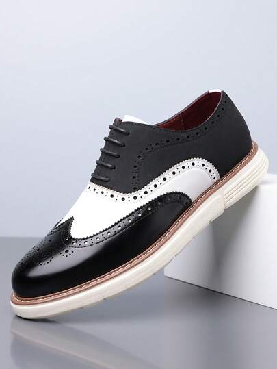 1双男士圆头系带布洛克鞋，PU鞋面，EVA鞋底，透气舒适，适合商务和休闲场合穿着。