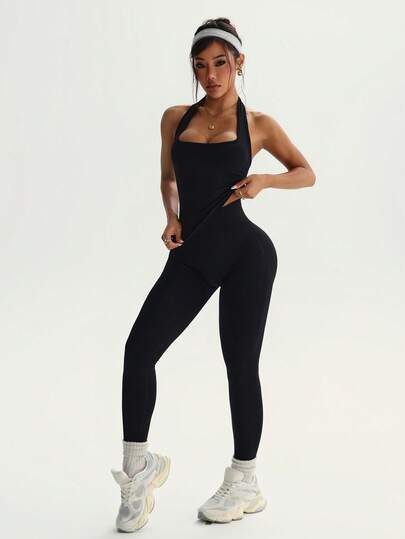 Bộ đồ tập thể dục 2 mảnh màu đen dành cho nữ mùa xuân và hè, gồm áo croptop cổ yếm và quần legging cạp cao ôm sát bụng, nâng hông, hoàn hảo cho tập luyện và mặc thường ngày.