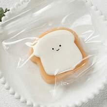 1个可爱柔软的挤压玩具，挤压后会缓慢恢复原状。这款毛绒玩具适合缓解压力，青少年和成人均可使用。可在办公室使用，帮助放松身心（14岁及以上）。 - A - 查看 4