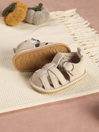 1 đôi dép xăng đan trẻ em màu trơn, kiểu dáng tối giản, chống trơn trượt, thích hợp cho mùa xuân và mùa hè.