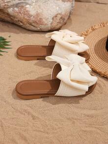 1 par de sandalias de playa para niñas de color beige, con un gran lazo y un diseño tejido, de material suave de PU con puntera redonda y suela plana, cómodas y tipo romano, adecuadas para niñas de 3 a 15 años para uso diario casual y vacaciones de verano, nuevo lanzamiento - Beis - Ver 4