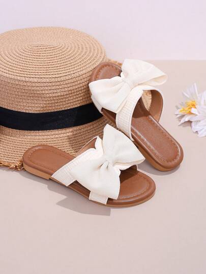 1 par de sandalias de playa para niñas de 3 a 15 años, de diseño con lazo tejido, material suave de PU, punta redonda, estilo slip-on, planas, cómodas y lindas, ideales para uso diario, playa y verano, nuevo lanzamiento