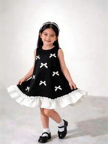 4-8岁女童优雅连衣裙 - 黑色无袖A字连衣裙，饰有白色蝴蝶结贴花和荷叶边下摆 | 适合派对、婚礼或特殊场合 - 黑色 - 查看 3