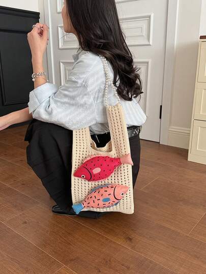 独特设计的针织镂空休闲手提包，配珍珠链条肩带，度假单肩包