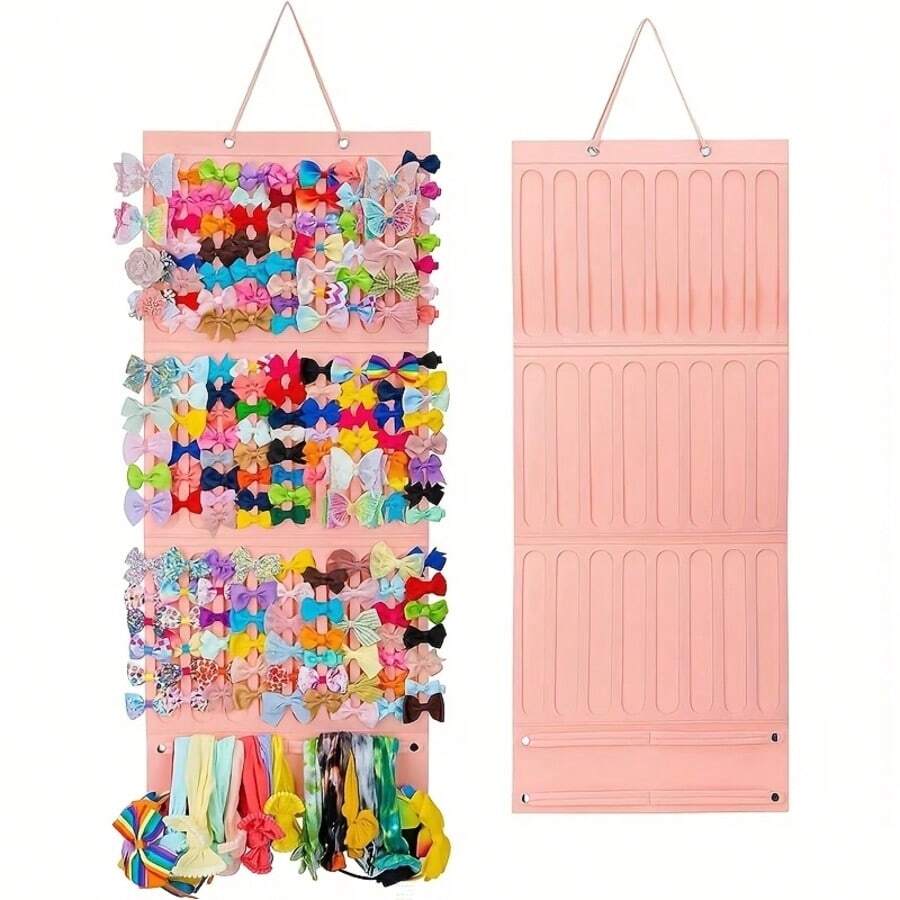 Caixa Organizadora Dobrável para Acessórios de Cabelo (1 unidade) - Bolsa Organizadora de Parede com Vários Compartimentos, Ideal para Guardar Presilhas, Tiaras e Laços. Organizadora e prática para sua casa. Ganchos para Presilhas de Cabelo. Bolsa de grande capacidade para pendurar acessórios de cabelo, perfeita para meninas e mulheres. Ajuda a manter sua coleção organizada e evita que os acessórios se percam ou se enrolem. Durável e compacta, comporta 18 estilos diferentes. - Multicolorido - Ver 1