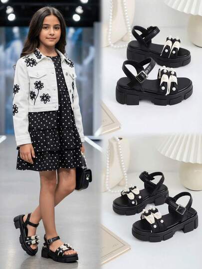 1双黑色幼儿/女童坡跟凉鞋，柔软舒适的PU交叉绑带材质，可调节搭扣鞋跟上饰有闪亮珍珠，圆头3厘米粗跟，时尚公主风沙滩凉鞋，适合3-15岁女孩，2026春夏款