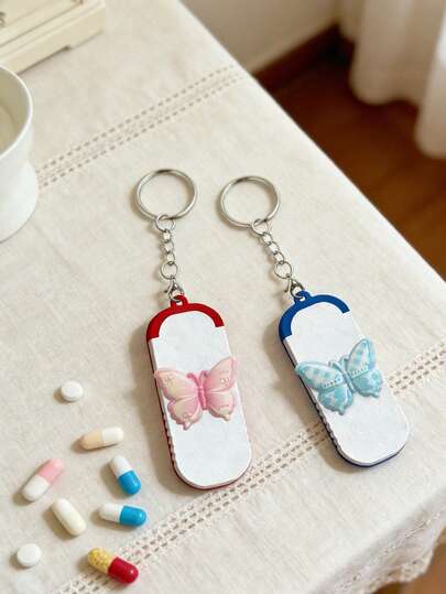 Organizador portátil de pastillas - Estuche mini de pastillas con decoración de mariposa hecha a mano | Adecuado para almacenar tabletas, vitaminas, suplementos y medicamentos diarios | Esencial para viajes, organizador de escritorio, amigable para bolsos, a prueba de agua y a prueba de fugas | Gran regalo para mamá, papá, graduación, Día de la Madre, Día del Padre