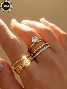 Bộ nhẫn Znice 2026 mới, mạ vàng 18K, thép không gỉ, thiết kế tối giản, đính đá lấp lánh toàn bộ hình hoa, có thể đeo chồng lên nhau, thích hợp cho tiệc tùng, làm quà tặng, đeo hàng ngày, nhiều dịp khác nhau, làm trang sức, chống thấm nước và chống phai màu, thích hợp đeo khi đi biển. - Vàng 4 - Xem 12