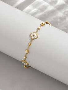 1 chiếc vòng tay nữ bằng thép không gỉ mạ vàng hình hoa bốn lá đính hạt và kim cương giả, trang sức thời trang mạ vàng 18K. - vàng - Xem 2