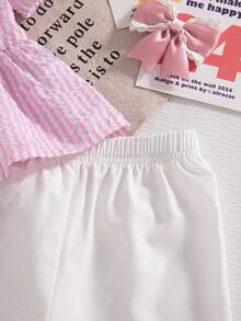 Bộ trang phục thường ngày dễ thương cho bé gái mùa hè: áo hồng kẻ caro tay bồng thắt nơ và quần short trắng rộng rãi. - Hồng - Xem 3