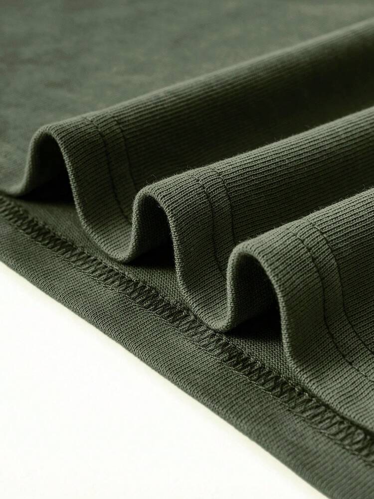 Green Short-Sleeved T-Shirt Made Of 100% Polyester With A Custom Design, Featuring The Text "ALPHA" And A Minimalist Logo Print. Breathable Casual Wear For Men, Made Of Lightweight Fabric, Suitable For Summer. - Army Green - View 6