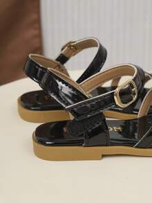 Mẫu dép xăng đan liền thân thời trang trẻ em mới năm 2026, kiểu dáng trung tính, phù hợp cho mùa hè. Giày dép trẻ em chất lượng cao, thanh lịch, đơn giản. - màu đen - Xem 8