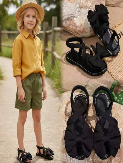 1 đôi dép xăng đan đế bằng bằng vải mềm màu đen cho bé gái sơ sinh/trẻ nhỏ, màu trơn với nơ trang trí, mũi tròn, đế mềm chống trượt, kiểu dáng xỏ chân, dép xăng đan đi biển kiểu công chúa dễ thương thời trang Bohemian, phù hợp cho đi chơi, đi học, đi nghỉ mát, mẫu mới mùa xuân/hè.