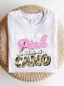 Nuevas  de moda: Camiseta de mujer rosa con encantador estampado de camuflaje "Danger" - de corte holgado, manga corta, cuello redondo, estilo casual, con llamativo texto de camuflaje y letras rosas, camisa de silueta en H adecuada para uso informal, una idea de regalo para amigos y familiares (lavable a máquina). - Negro - Ver 2
