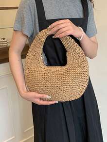 这款编织包采用休闲时尚的设计，浅棕色的包身展现出精致的手工编织纹理，使其成为海滩度假等场合的理想选择。 - 卡其色 - 查看 4