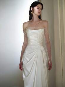 Elegant Off-Shoulder Satin Wedding Dress With Sheer Beaded Sleeves, Draped Bodice, And Sweep Train – Premium Heavyweight Satin Fabric, Fitted Mermaid Silhouette With Flared Hem, Off-Shoulder Neckline With Sheer Beaded Sleeves, Draped Bodice Detail, Sweep Train With Clean Hem, Available In Ivory – Perfect For Fall/Winter Indoor Church Weddings, Elegant Ballroom Ceremonies, And Modern Receptions, Luxurious And Structured Design, Ideal For Cooler Weather, International Export Quality, Suitable For Global Bridal Market - trắng - Xem 6