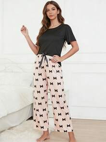 2 piezas Conjunto de pijama de primavera/verano para mujer, camiseta negra con estampado de lazo y pantalones de estar por casa casuales - Rosa - Ver 1