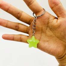 Llavero con estrellas que brillan en la oscuridad, adecuado para bolsos y mochilas, perfecto como recuerdo de fiesta y regalo de cumpleaños - Multicolor - Ver 11