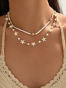 Bộ 2 chiếc vòng cổ thủ công phong cách Bohemian làm từ vỏ sò và hạt cườm, mặt dây chuyền hình sao biển màu ngọc lam và ngọc trai giả, đa năng cho đeo hàng ngày, du lịch, dự tiệc. - nhiều màu - Xem 1