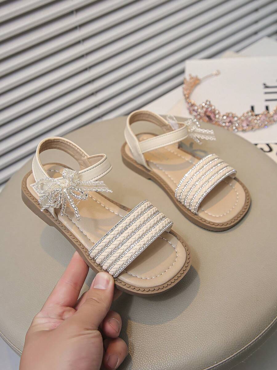 女童露趾凉鞋 - 可爱蝴蝶结装饰公主裙鞋,透气夏季平底凉鞋,适合儿童、婚礼、派对、海滩、日常穿着 - 米色 - 查看 1