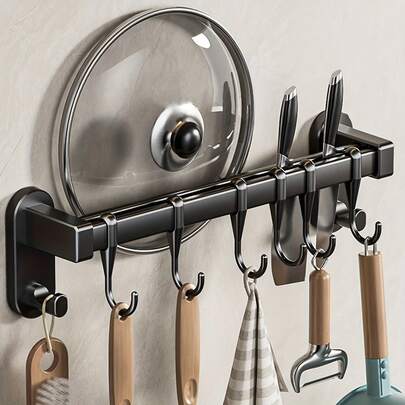Giá đựng đồ nhà bếp đa năng 1 mảnh, móc treo đồ, giá đựng thìa và muỗng, giá treo dao gắn tường. Giá đựng đồ gắn tường bằng nhựa bền chắc với móc điều chỉnh được, kèm theo băng dính và ốc vít đã được khoan sẵn. Lý tưởng để đựng dao kéo, dao, lọ gia vị, đũa và khăn lau bát đĩa. Hoàn hảo cho nhà bếp gia đình, nhà hàng và nhiều nơi khác. Món quà tuyệt vời cho lễ Phục sinh và Ngày của Mẹ. Giá đựng đồ nhà bếp tiết kiệm không gian.