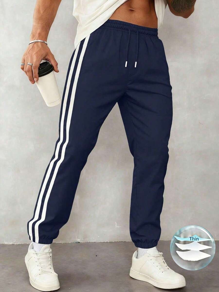 1pc Men's Casual Sports Pants, Loose Fit Lightweight Breathable Trousers For Running, Outdoor, Hiking, Jogging, Fitness Training, Summer Beach, Commuting, Fashionable Striped Cropped Pants Spring - Royal Blue - View 1