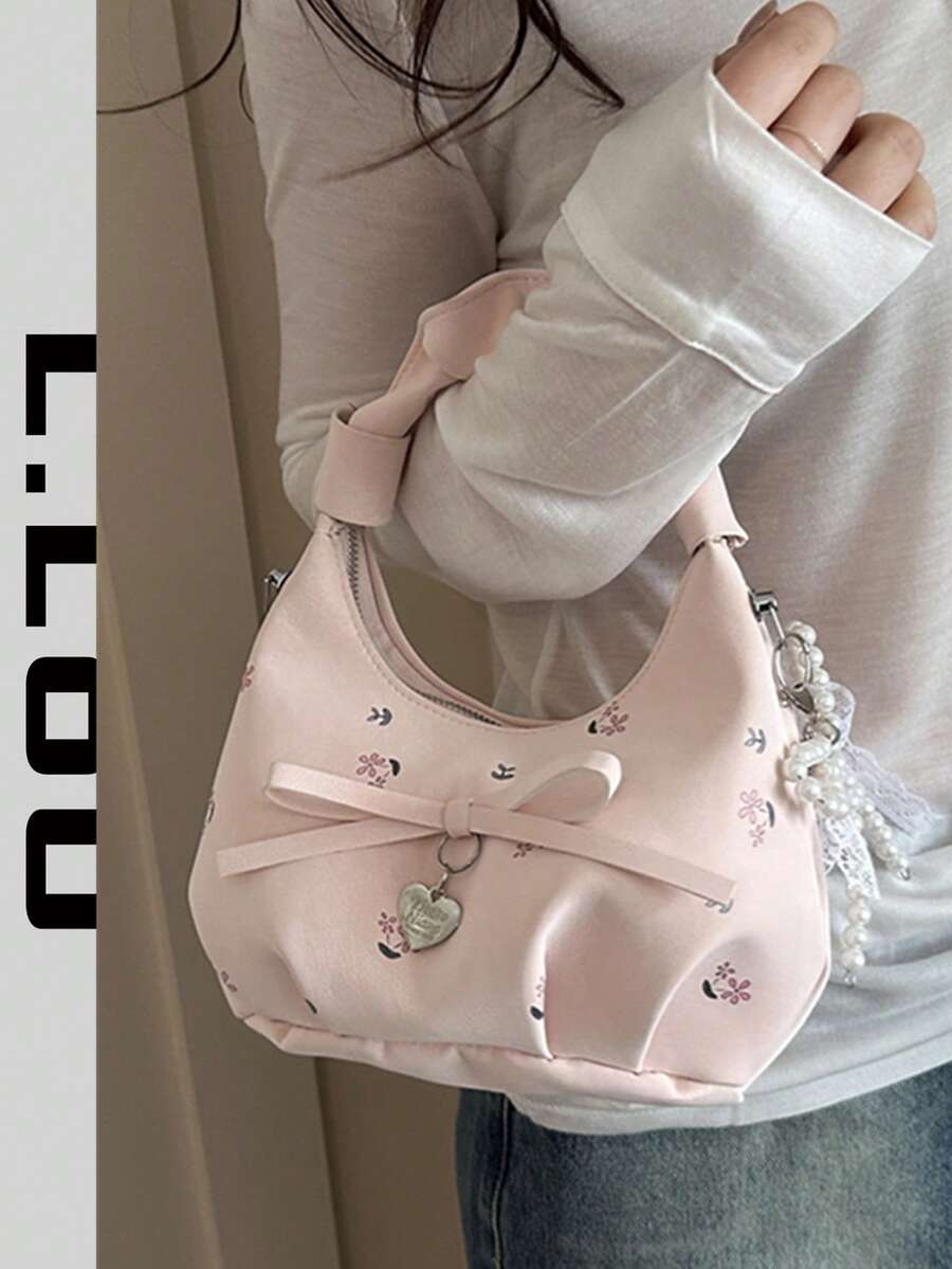 Mẫu mới năm 2026: Túi xách nữ xếp ly in hoa, túi đeo chéo thời trang.