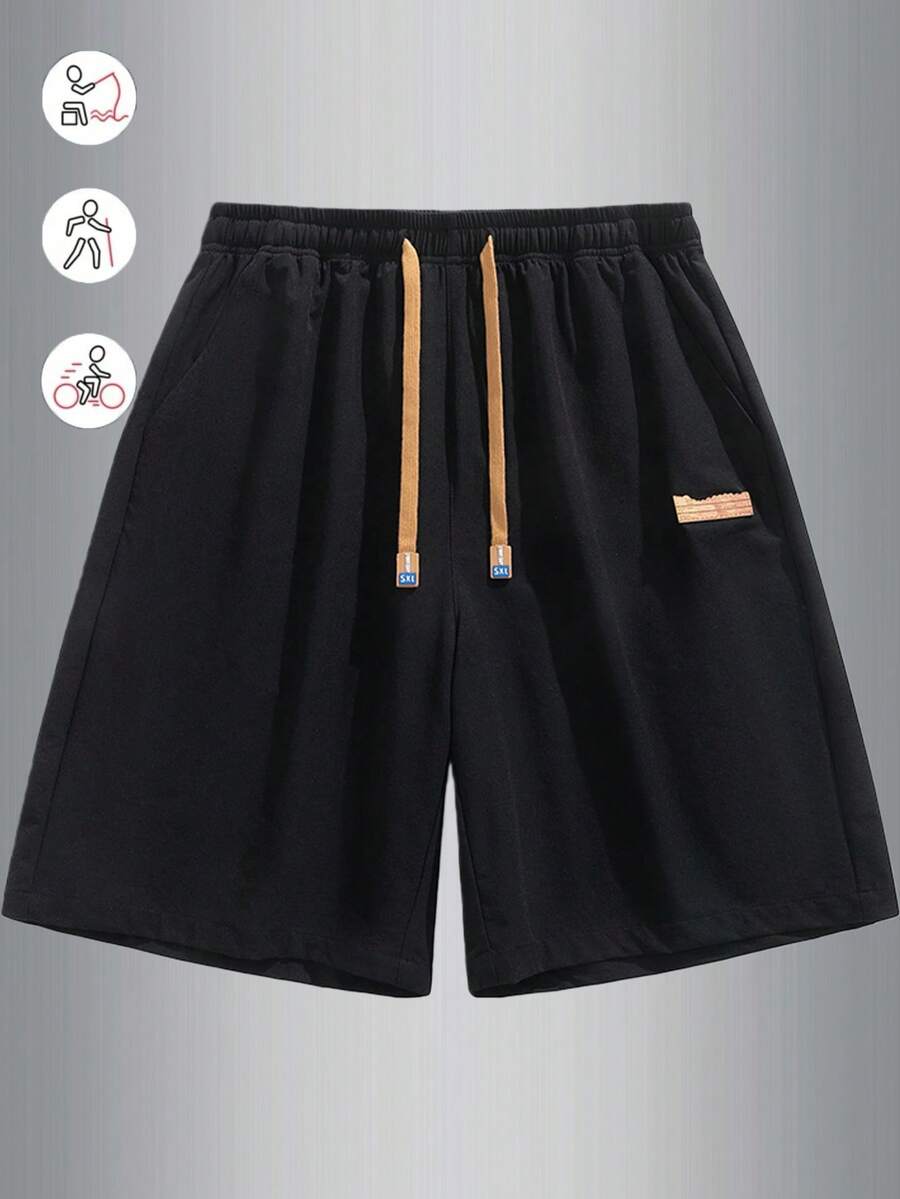 男士夏季休闲短裤,适合运动和户外活动,采用抽绳、口袋和侧开衩设计,非常适合徒步旅行、骑行、篮球等运动,也是送给男朋友的理想礼物。 - 黑色 - 查看 1