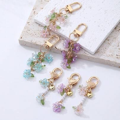Regenbogen Blumen Schlüsselanhänger - Acryl Blumen Charm mit Perlen und Glöckchen, ein süßes Accessoire für Taschen und Geldbörsen, ein perfektes Muttertagsgeschenk für den Frühling