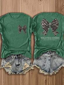Nueva camiseta de moda para primavera y verano para niñas, estilo europeo y americano, cuello redondo, mangas cortas, ligera, transpirable, con estampado elegante, diseño cómodo, detalle de lazo, corte holgado, adecuada para uso diario y salidas, top deportivo casual versátil para uso urbano. - Negro - Ver 7