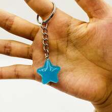 Llavero con estrellas que brillan en la oscuridad, adecuado para bolsos y mochilas, perfecto como recuerdo de fiesta y regalo de cumpleaños - Multicolor - Ver 13